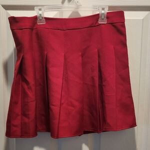 Red pleaded mini skirt